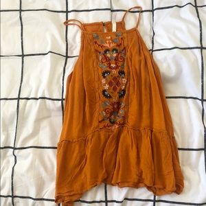 Embroidered Peplum Top